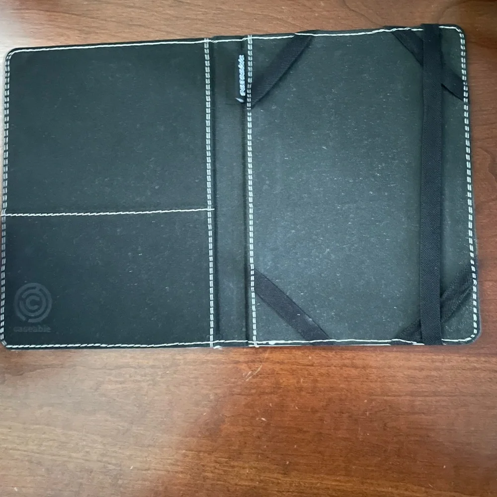 Caseable Tablet case cover 7” with peacock feather motif. Excellent pre used